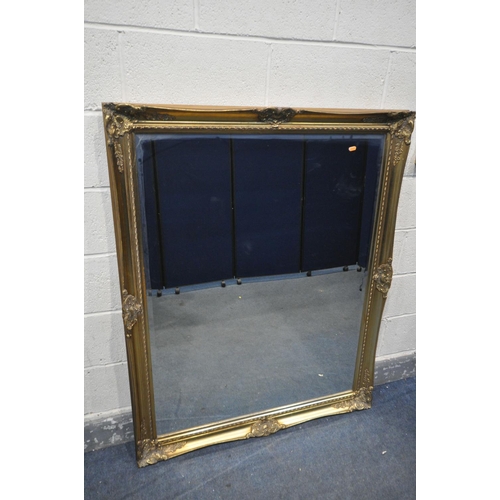 1335 - A LARGE GILT FRAMED BEVELLED EDGE MIRROR, 133cm x 107cm, along with another gilt framed mirror with ... 