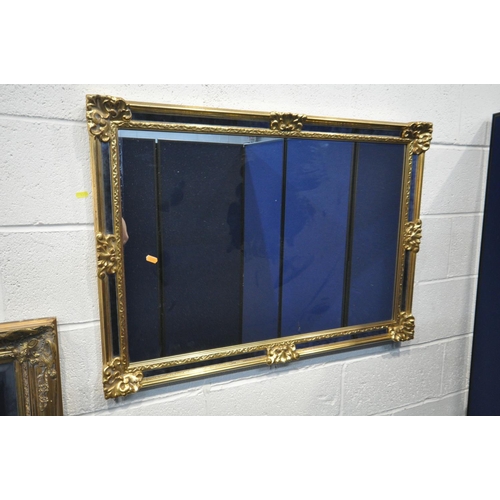 1335 - A LARGE GILT FRAMED BEVELLED EDGE MIRROR, 133cm x 107cm, along with another gilt framed mirror with ... 