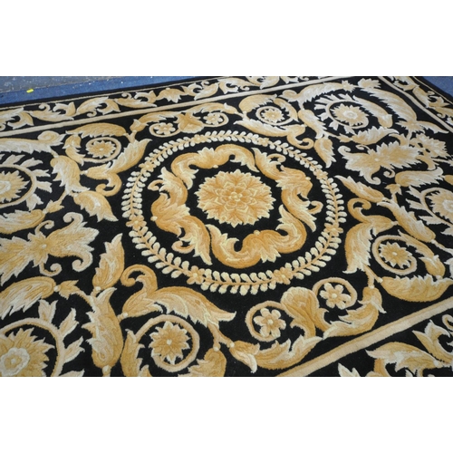 1339 - A G H FRITH WOOLLEN BLACK AND GOLD CHINESE RUG, 245cm X 152cm