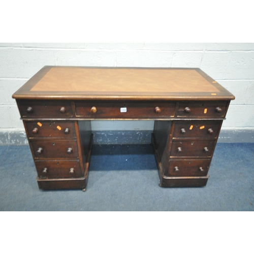 1352 - A VICTORIAN MAHOGANY PEDESTAL DESK, with an arrangement of nine drawers, on casters, width 119cm x d... 