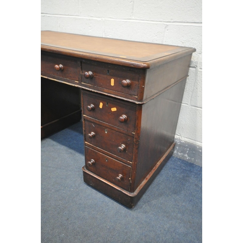 1352 - A VICTORIAN MAHOGANY PEDESTAL DESK, with an arrangement of nine drawers, on casters, width 119cm x d... 