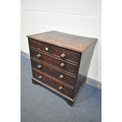 1360 - A GEORGIAN MAHOGANY CHEST OF FOUR LONG GRADUATED DRAWERS, with turned handles, on bracket feet, widt... 