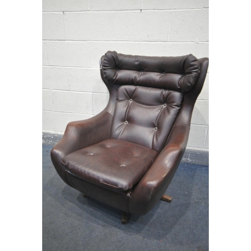 1361 - A MID CENTURY PARKER KNOLL STATESMAN BROWN LEATHERETTE SWIVEL ARMCHAIR (this armchair does not compl... 