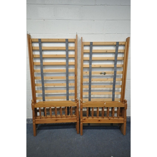 1368 - TWO PINE SINGLE BEDSTEADS, with all bolts (condition:-some paint splashes)