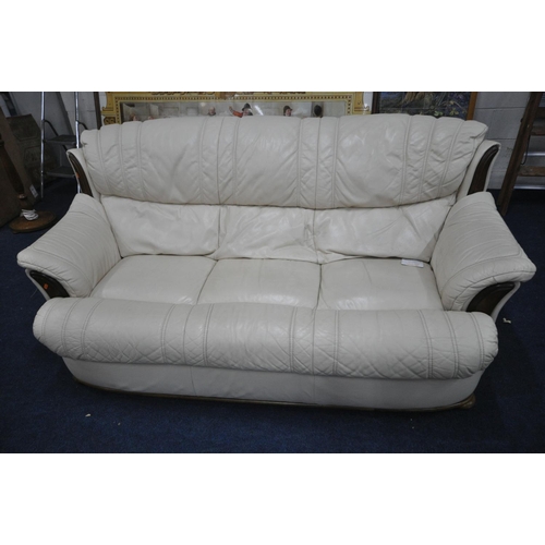 1370 - A CREAM LEATHER THREE SEATER SETTEE, length 199cm