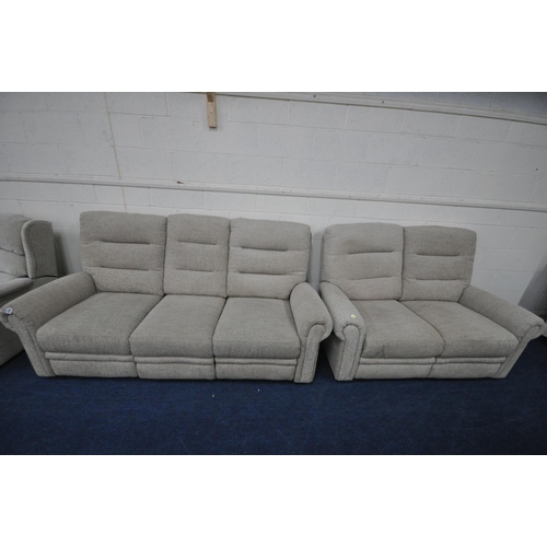 1374 - A BEIGE UPHOLSTERED ELECTRIC RECLINING SUITE, comprising a three seater settee, length 207cm, and a ... 