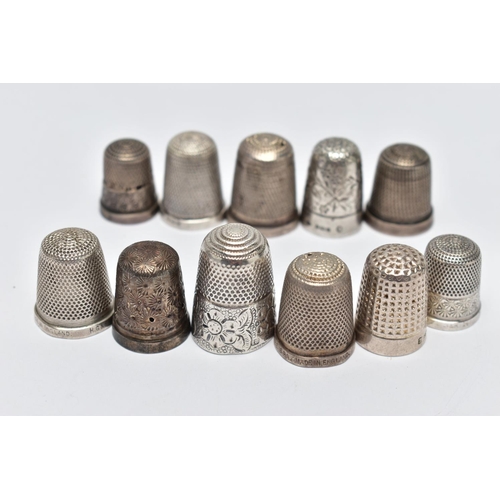 107 - AN ASSORTMENT OF SILVER AND WHITE METAL THIMBLES, comprising eight silver thimbles of various design... 