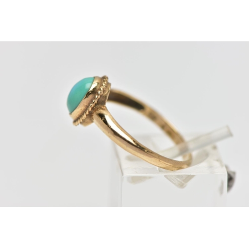 123 - A 9CT GOLD TURQUOISE RING, designed with an oval turquoise cabochon, collet set with a fine rope twi... 