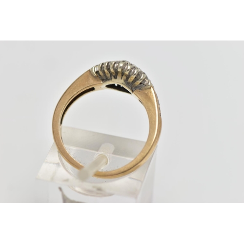 124 - A 9CT GOLD DIAMOND CLUSTER RING, of a marquise form set with single cut diamonds, single cut diamond... 