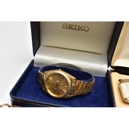 149 - A BOX OF ASSORTED WRISTWATCHES AND LIGHTERS, mostly quartz movements, such as a gents boxed 'Seiko' ... 