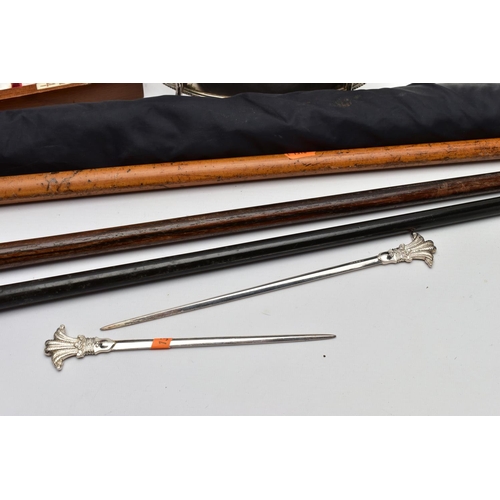 181 - THREE WALKING STICKS, AN UMBRELLA AND OTHER ITEMS, to include a light wooden walking stick fitted wi... 