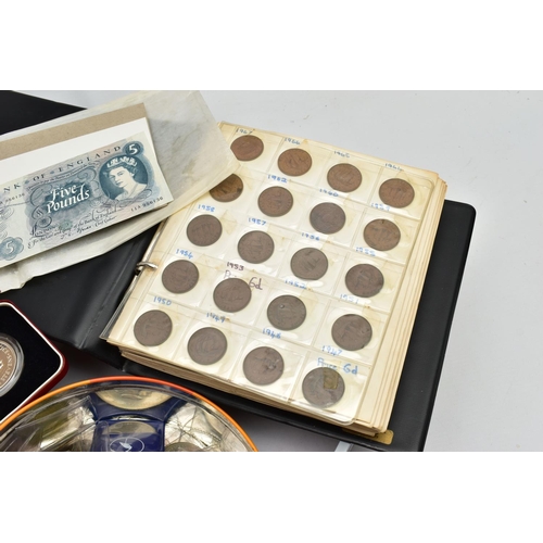 196 - A TIN AND FILE CASE OF COINS AND BANKNOTES, to include a cased set of Sir Winston Churchill commemor... 