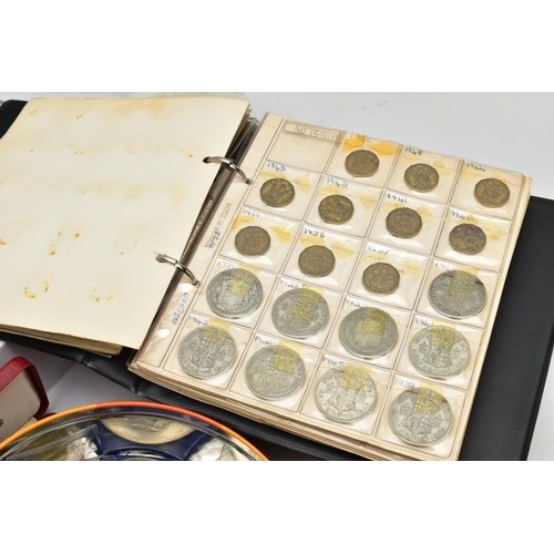 196 - A TIN AND FILE CASE OF COINS AND BANKNOTES, to include a cased set of Sir Winston Churchill commemor... 