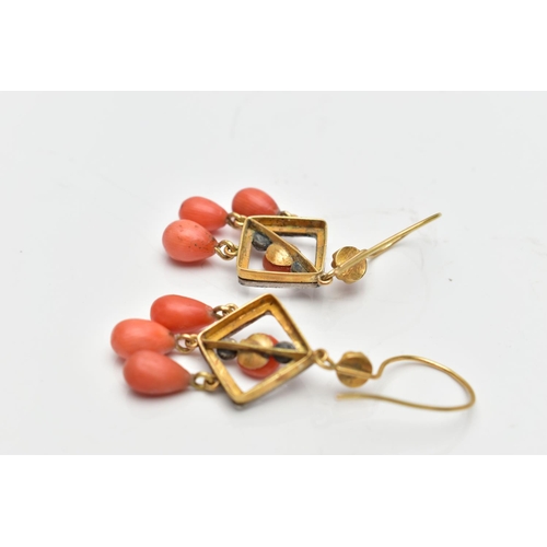 207 - A PAIR OF ENAMEL, CORAL AND DIAMOND DROP EARRINGS, each earring is designed with a white enamel open... 