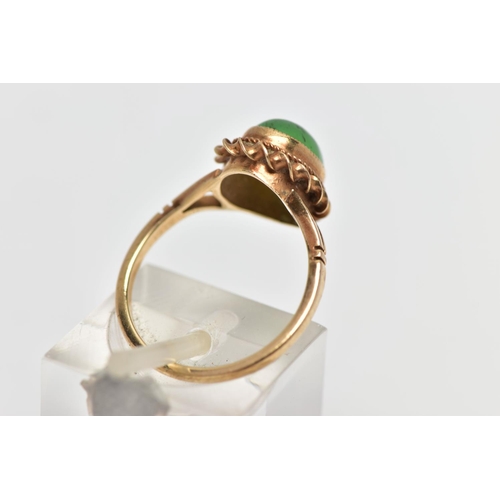 25 - A 9CT GOLD CHRYSOPRASE SINGLE STONE RING, the oval chrysoprase cabochon collet set with rope twist s... 