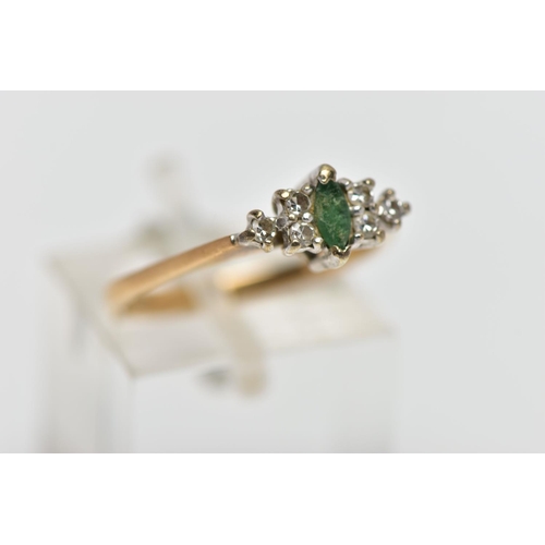 26 - A 9CT GOLD EMERALD AND DIAMOND DRESS RING, the marquise cut emerald, with a trefoil of single cut di... 