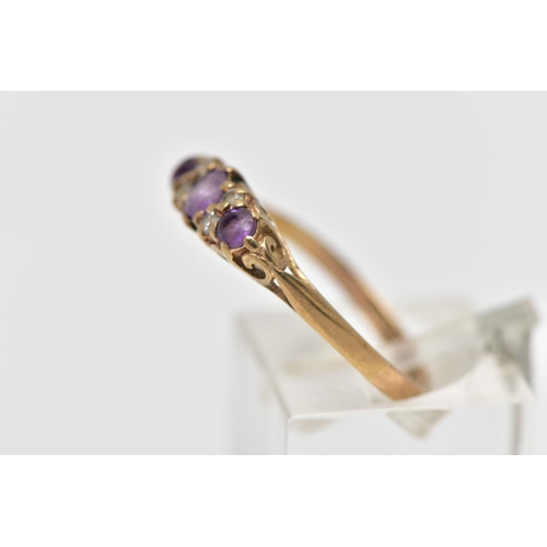 28 - A 9CT GOLD AMETHYST AND CUBIC ZIRCONIA DRESS RING, the circular cut amethyst and similarly cut cubic... 