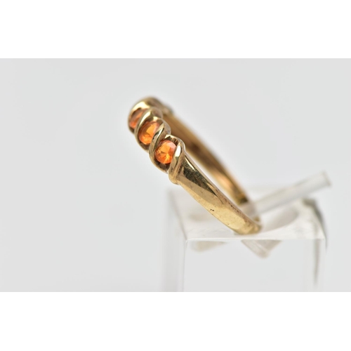 31 - A 9CT GOLD FIRE OPAL FIVE STONE RING, the circular cut fire opals within a partial twist collet sett... 