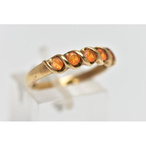 31 - A 9CT GOLD FIRE OPAL FIVE STONE RING, the circular cut fire opals within a partial twist collet sett... 