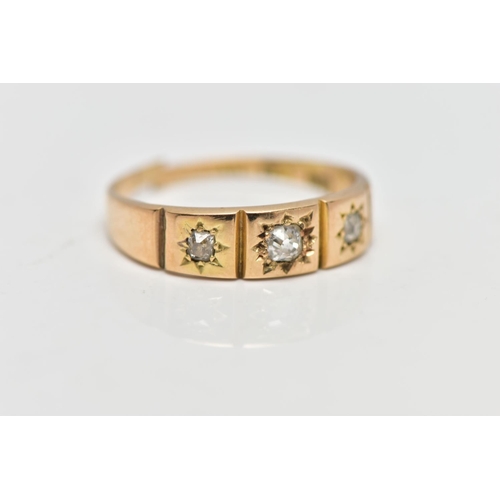 4 - AN YELLOW METAL THREE STONE DIAMOND RING, (A/F), designed with three star set, old mine cut diamonds... 