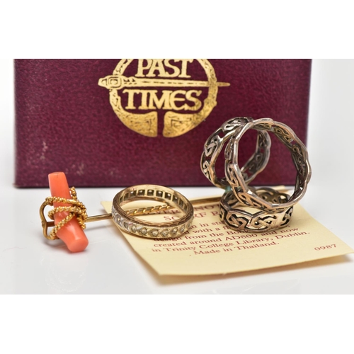 46 - A 9CT GOLD ETERNITY RING, A YELLOW METAL CORAL STICKPIN AND A SCARF RING, the first designed as a ci... 