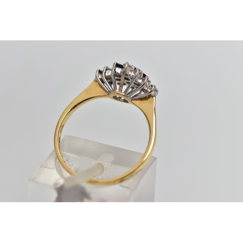 70 - AN 18CT YELLOW AND WHITE GOLD SAPPHIRE AND DIAMOND DRESS RING, the marquise shape tiered cluster set... 