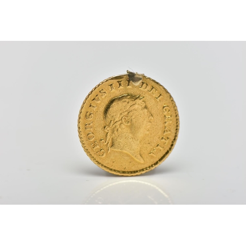 74 - A GEORGE III THIRD GUINEA COIN, depicting George III to the obverse and a crown to the reverse dated... 