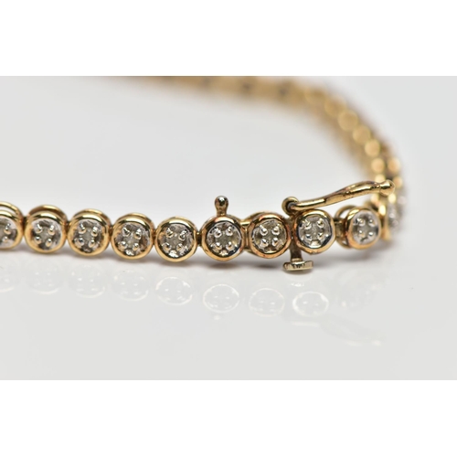 76 - A 9CT YELLOW GOLD DIAMOND LINE BRACELET, set with approximately fifty one single cut diamonds, each ... 