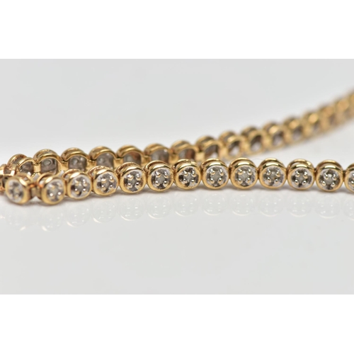 76 - A 9CT YELLOW GOLD DIAMOND LINE BRACELET, set with approximately fifty one single cut diamonds, each ... 