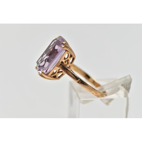 77 - A 9CT GOLD AMETHYST SINGLE STONE RING, the rectangular shape amethyst measuring approximately 14mm x... 