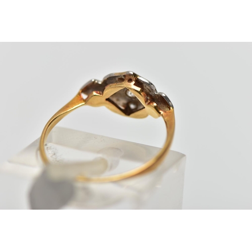 80 - A YELLOW METAL DIAMOND DRESS RING, designed as a series of single cut diamonds set within a foliate ... 