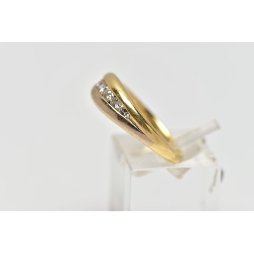 83 - AN 18CT GOLD SEVEN STONE DIAMOND RING, designed as a graduated series of brilliant cut diamonds with... 