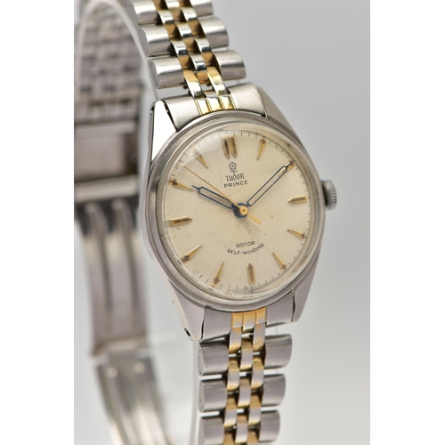 86 - A GENTLEMENS TUDOR WRISTWATCH, the circular white dial, with baton hourly markers, dial signed 'Tudo... 