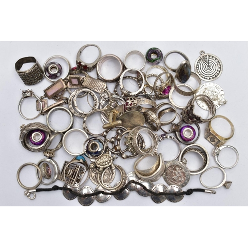 96 - A LARGE ASSORTMENT OF WHITE METAL RINGS, to include dress and fashion rings, together with an assort... 