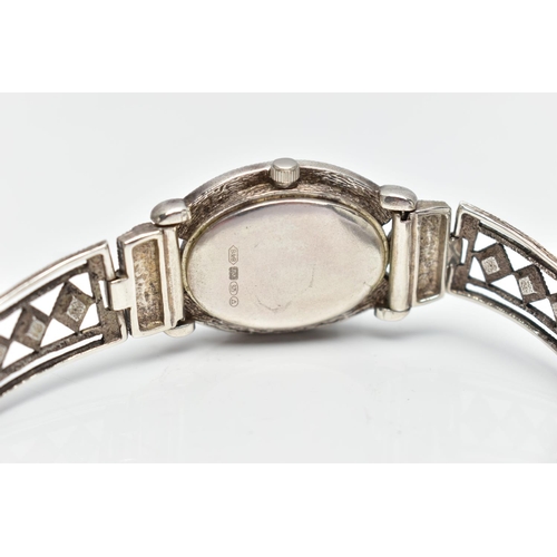 97 - A LADIES SILVER WRISTWATCH, the oval mother of pearl dial, with Roman numeral markers, dial with log... 