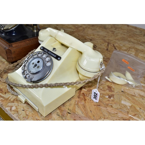 302 - THREE G.P.O AND VINTAGE STYLE LANDLINE PHONES, comprising a cream G.P.O. dial phone (broken receiver... 