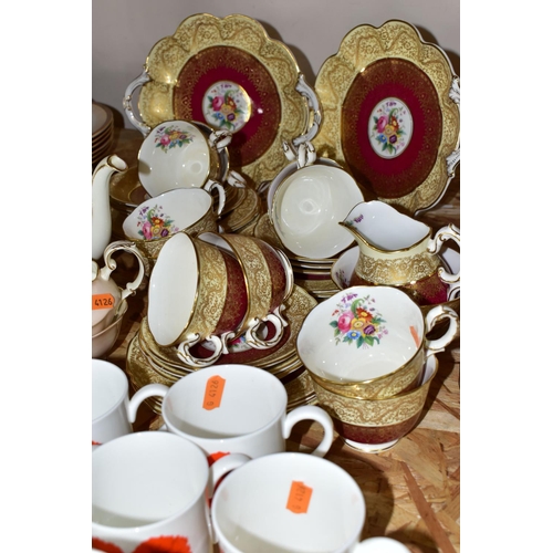 304 - THREE SETS OF CHINA TEAWARES, comprising a Bishop & Stonier 1930s red and gold floral tea set 'R101'... 