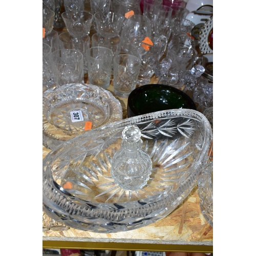 307 - A QUANTITY OF CUT AND COLOURED GLASS, comprising a large clear cut crystal ashtray, diameter 17cm, a... 