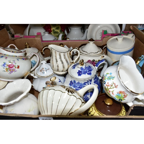 309 - FIVE BOXES OF TEAPOTS, TEAWARES AND CERAMICS, to include an Apulum tea set, twenty teapots by variou... 