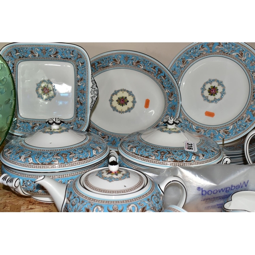 316 - A WEDGWOOD 'FLORENTINE' TURQUOISE DINNER AND TEA SET, comprising eight dinner plates, eight dessert ... 