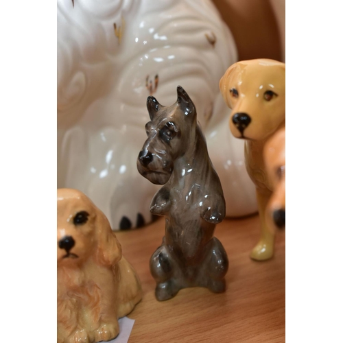 343 - A GROUP OF SIXTEEN ASSORTED BESWICK DOG FIGURES AND A ROYAL DOULTON TERRIER, including two pipe tray... 