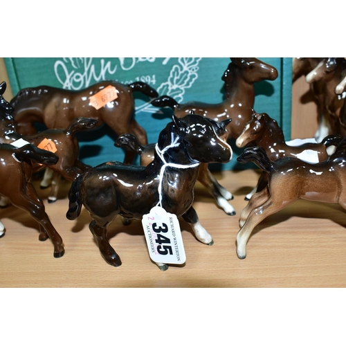 345 - A BESWICK WALL PLAQUE 'TROY', NO.2699, TOGETHER WITH FOURTEEN BESWICK BROWN GLOSS AND MATT FOALS, th... 