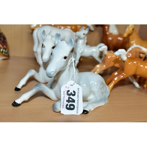 349 - TWELVE PALOMINO, GREY AND MATT WHITE BESWICK FOALS, ETC, including two Foal- lying, no. 915, a Foal ... 