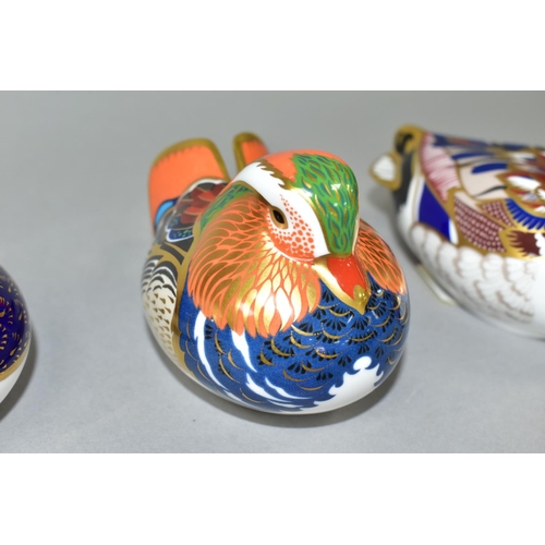 355 - THREE ROYAL CROWN DERBY PAPERWEIGHTS, comprising Quail, gold stopper, Mandarin Duck, silver stopper ... 