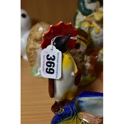 369 - FOURTEEN BESWICK FIGURES AND SCULPTURES, including a limited edition Mrs Rabbit Baking, ECF 13, no.1... 