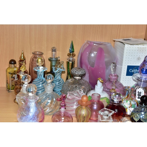 384 - A COLLECTION OF ASSORTED PERFUME BOTTLES INCLUDING A BOXED CAITHNESS LIMITED EDITION DEWDROP PERFUME... 