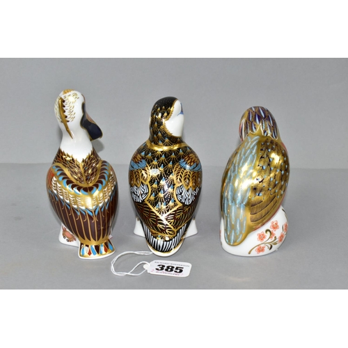 385 - THREE ROYAL CROWN DERBY PAPERWEIGHTS, comprising Puffin, pale gold stopper, Kingfisher, gold stopper... 