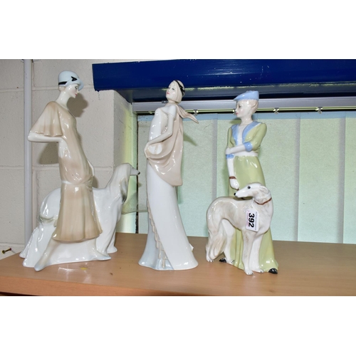 392 - THREE ROYAL DOULTON REFLECTIONS FIGURINES, comprising Park Parade HN3116, signed in gold to base by ... 