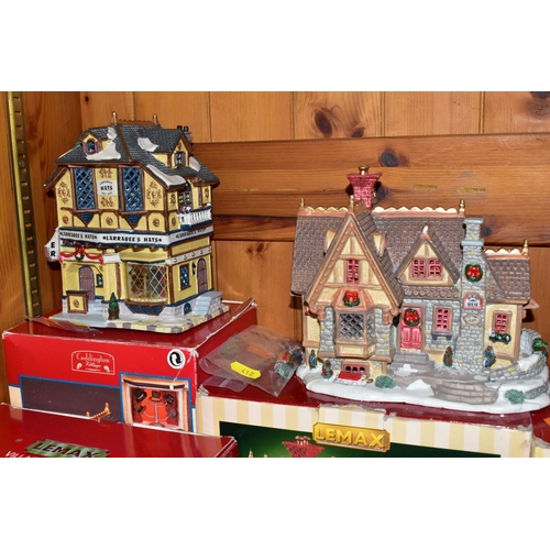 412 - BOXED LEMAX CHRISTMAS VILLAGE ITEMS, to include five buildings - two houses, a school, an inn and a ... 