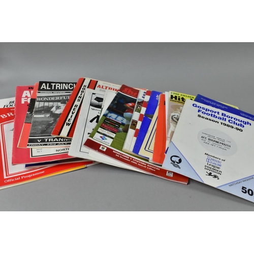 421 - FOOTBALL PROGRAMMES & EPHEMERA a large collection of 100+ mostly non-league football programmes, int... 